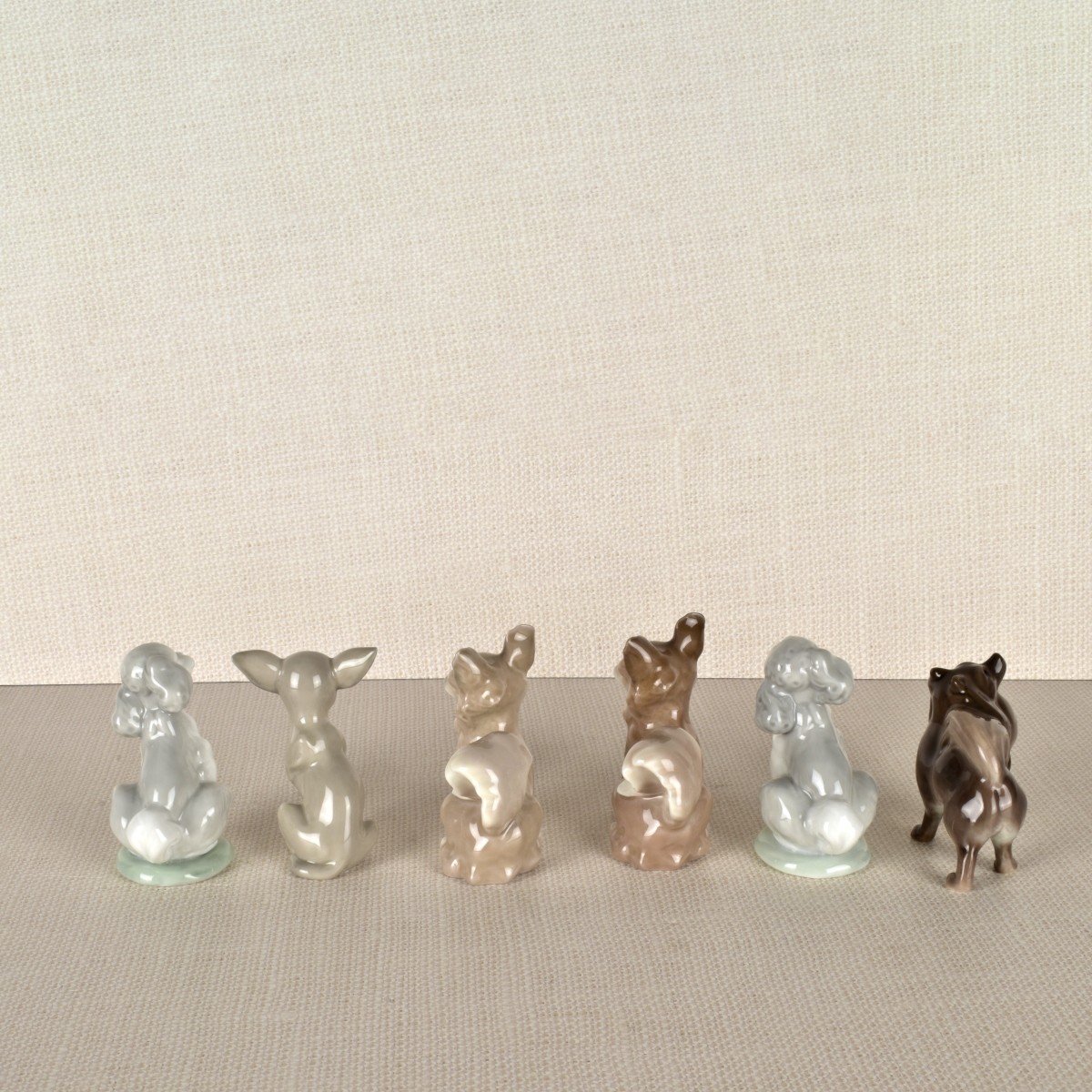Six Porcelain Dog Figurines mostly Lladro