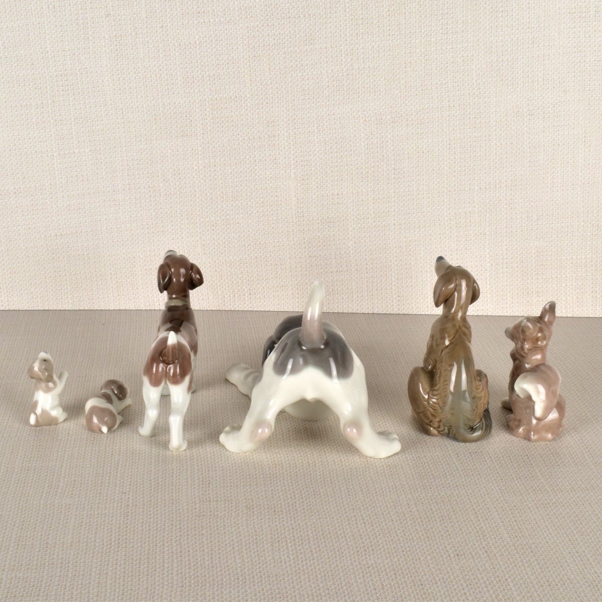Six Lladro Porcelain Dog Figurines