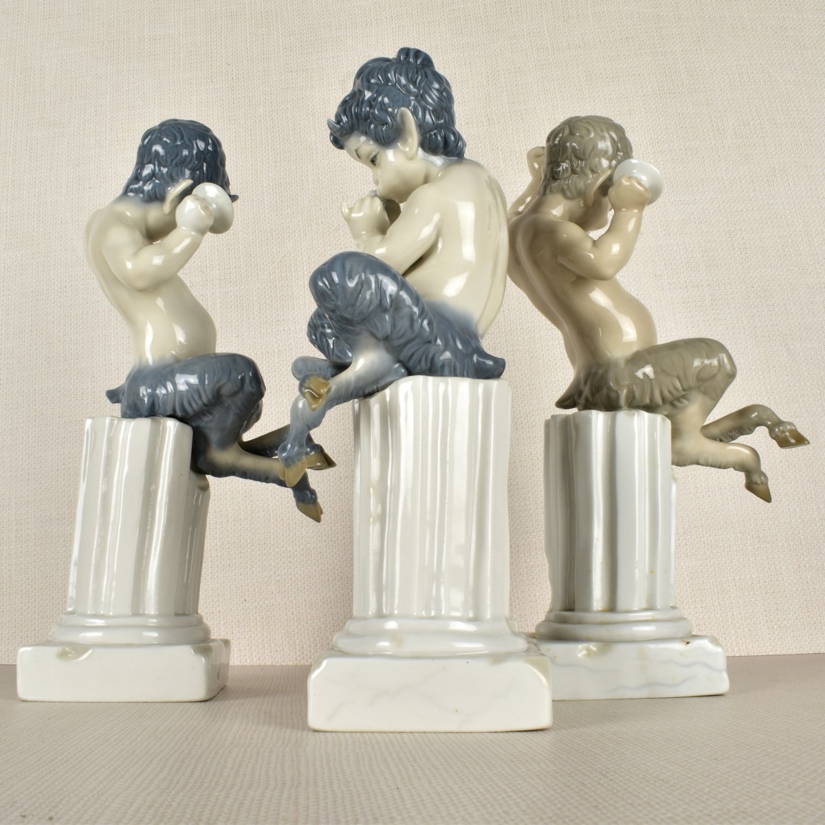 Three Lladro Satyr / Pan Porcelain Figurines