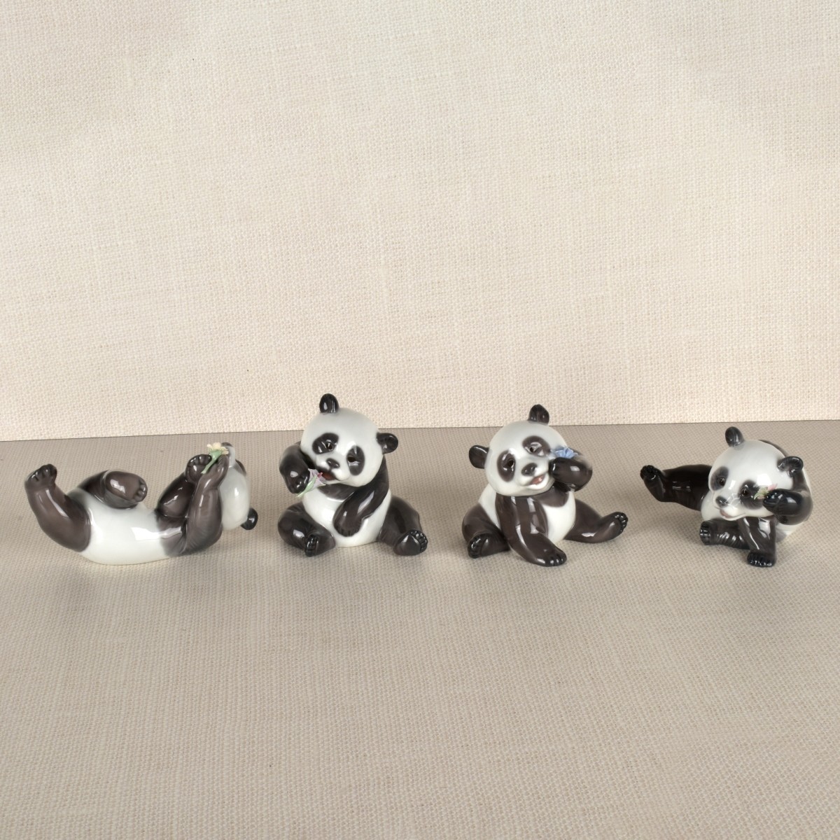 Four Lladro Porcelain Panda Figurines