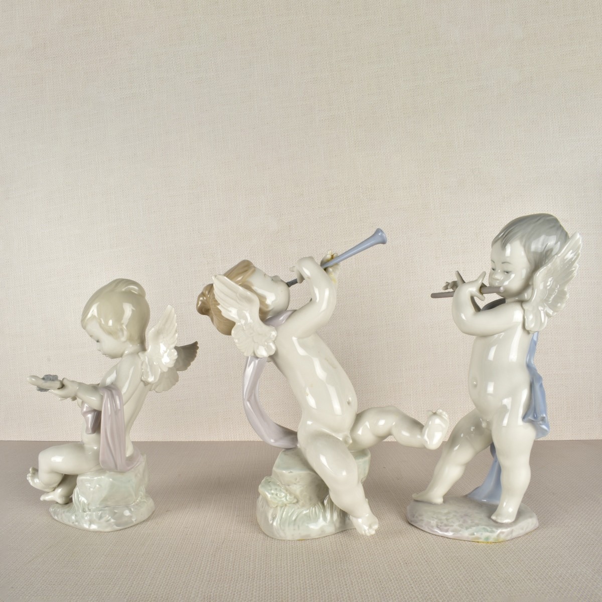 Lladro Cupid Figurines