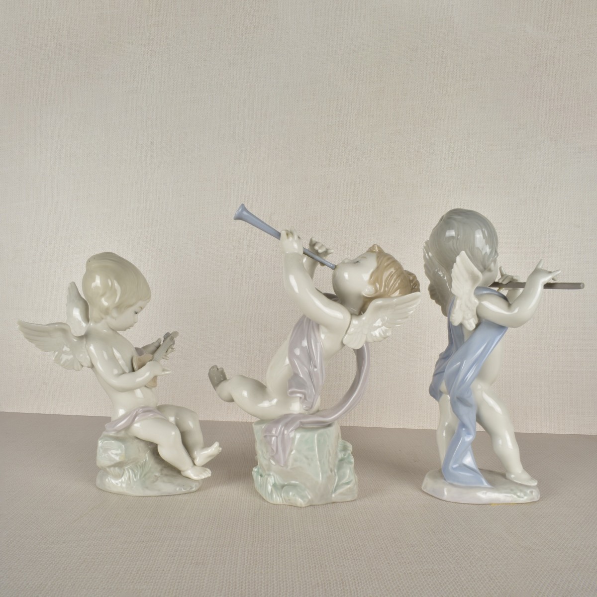 Lladro Cupid Figurines