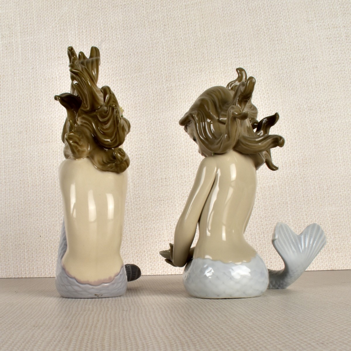 Two (2) Lladro Porcelain Mermaids