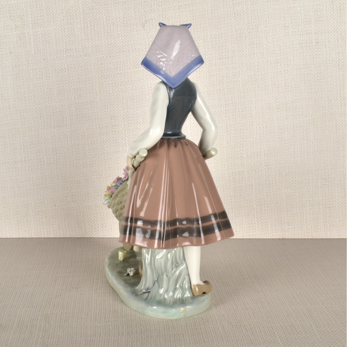 Lladro Figurine of a Girl with FLowers