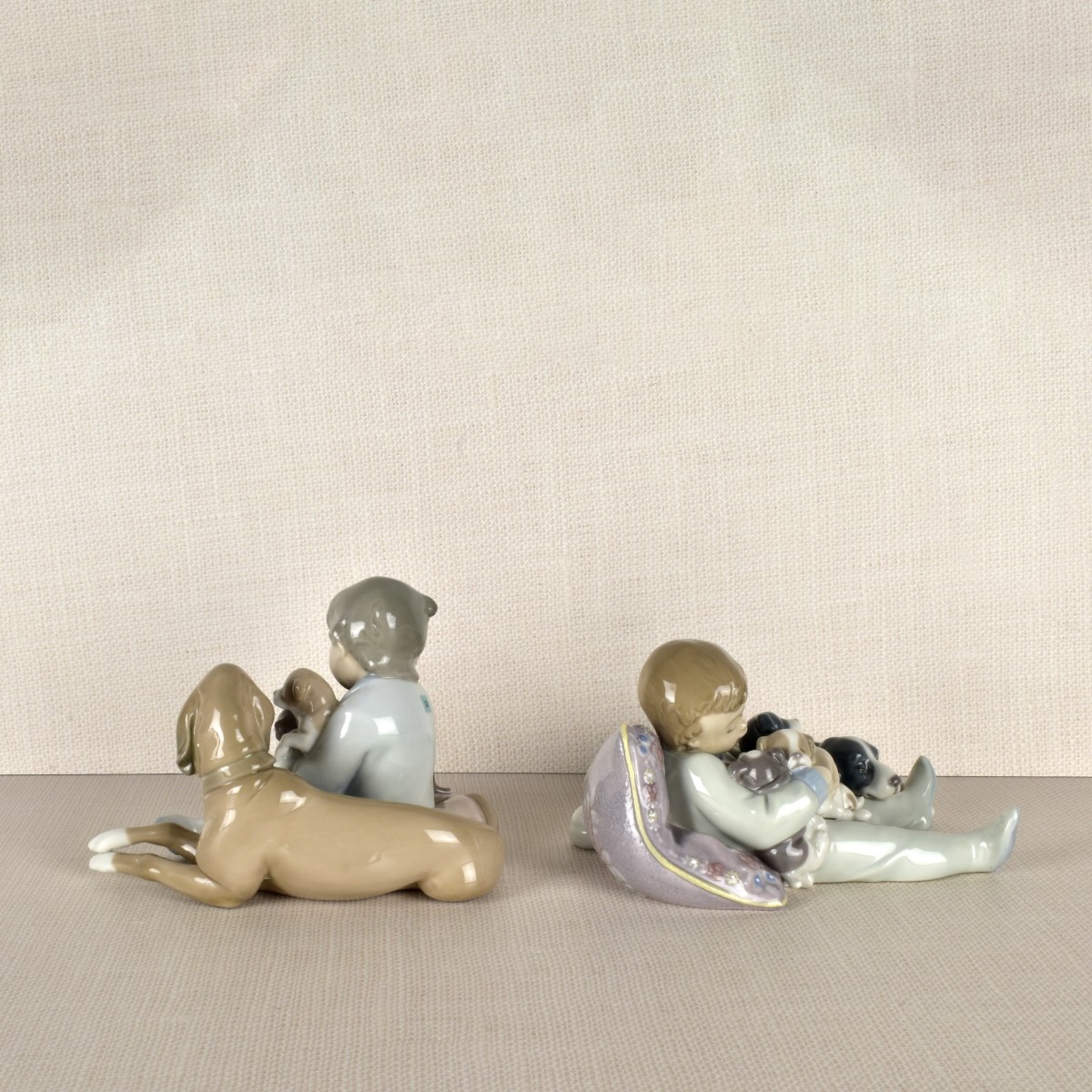 Two Lladro Porcelain Dogs with Children