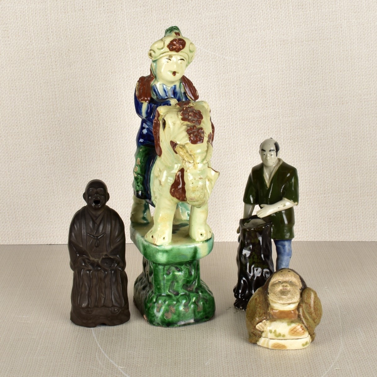 Four (4) Asian Porcelain Figures