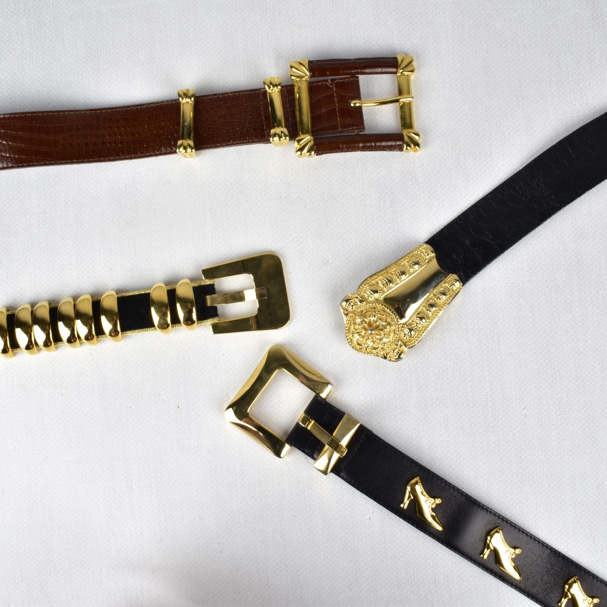 Four Designer Belts