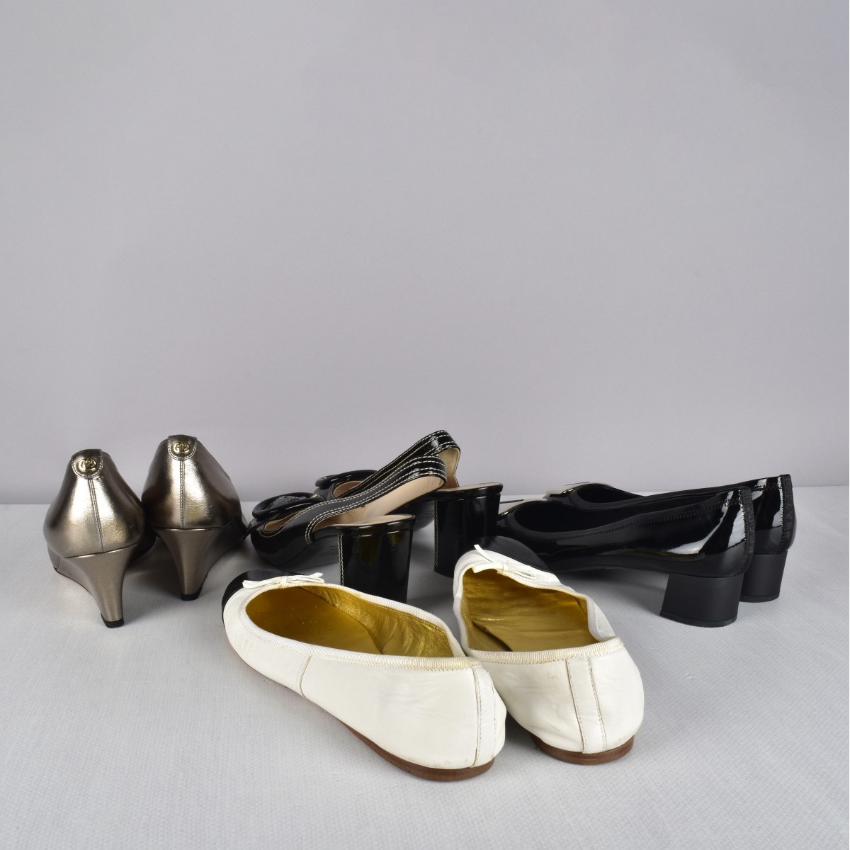 Four pr Prada and Gucci Designer Shoes
