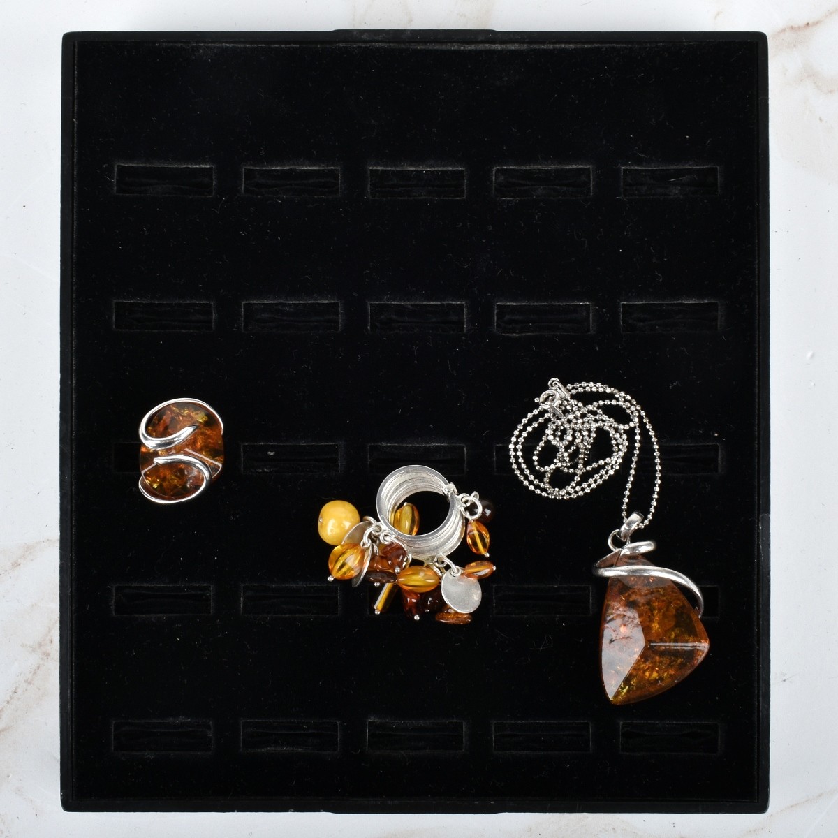 Collection of Amber and Sterling Silver Jewelry