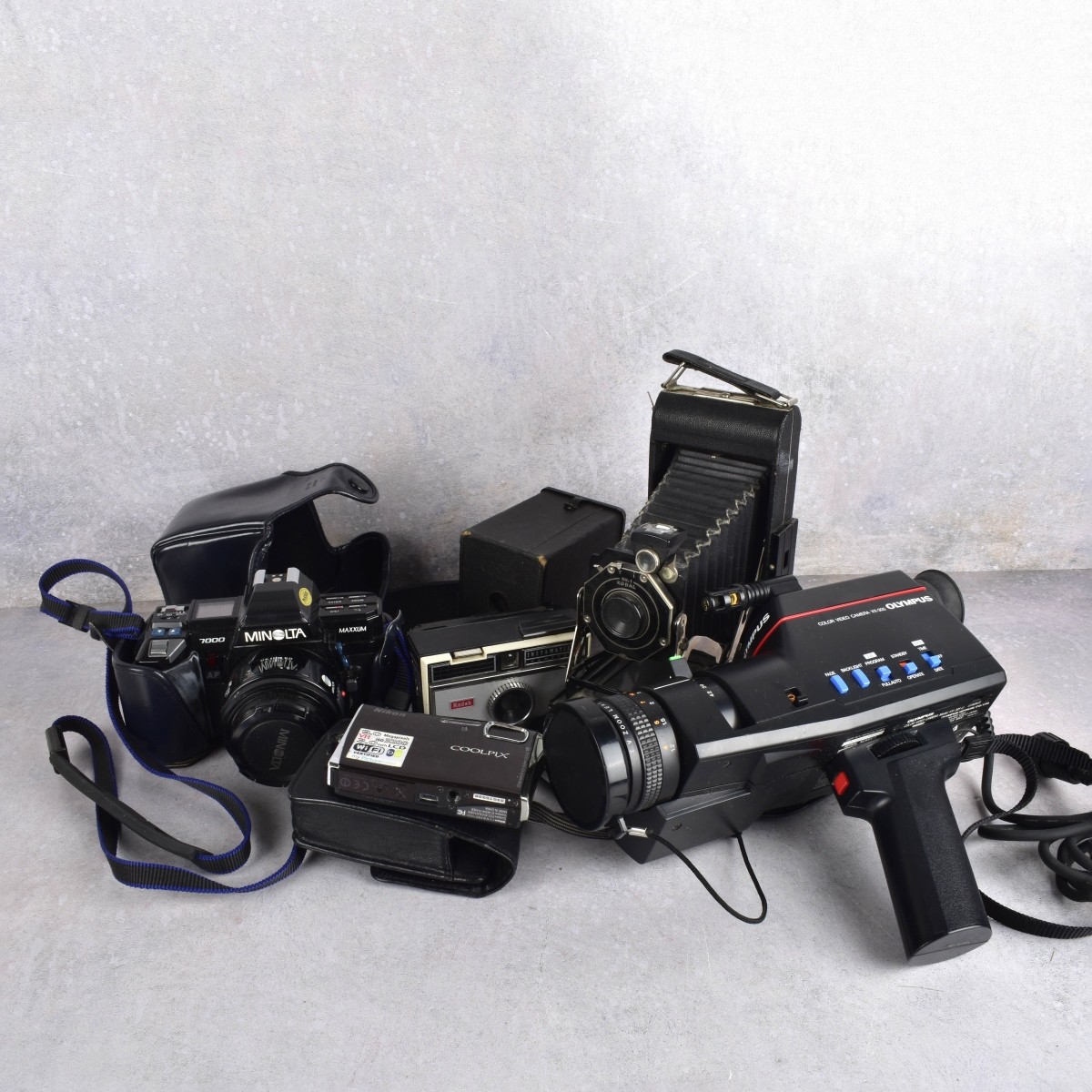 Assorted Cameras, Lenses, and Equipment