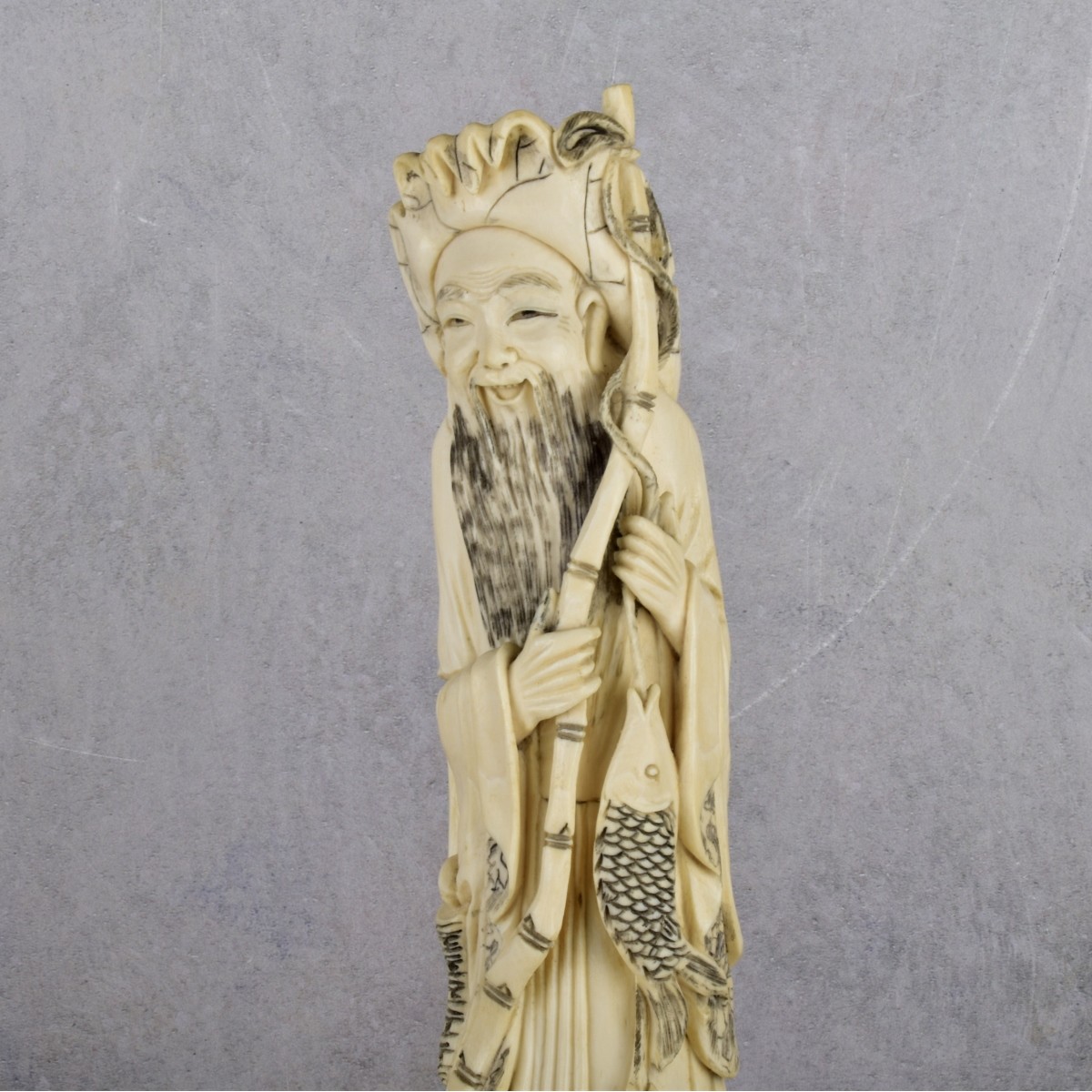 Antique Chinese Carving of a Fisherman