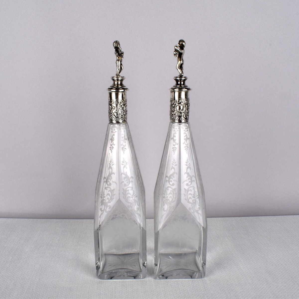 Continental Silver and Etched Bottles