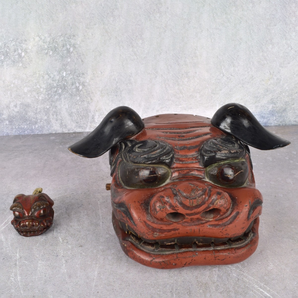 Carved Red Lacquered Asian Wood Masks