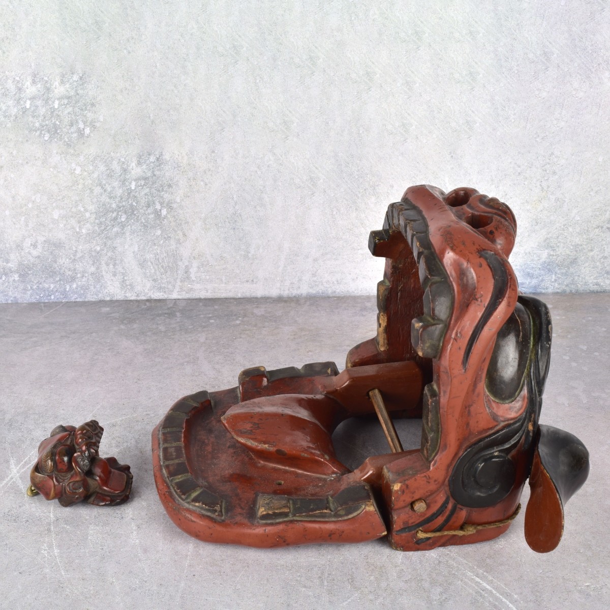 Carved Red Lacquered Asian Wood Masks