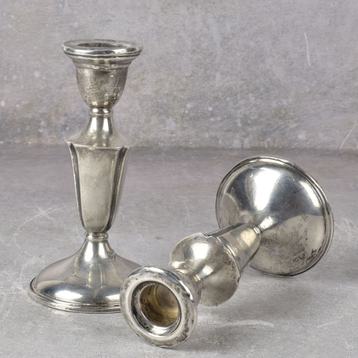 Pair of Weight Sterling Silver Candlesticks
