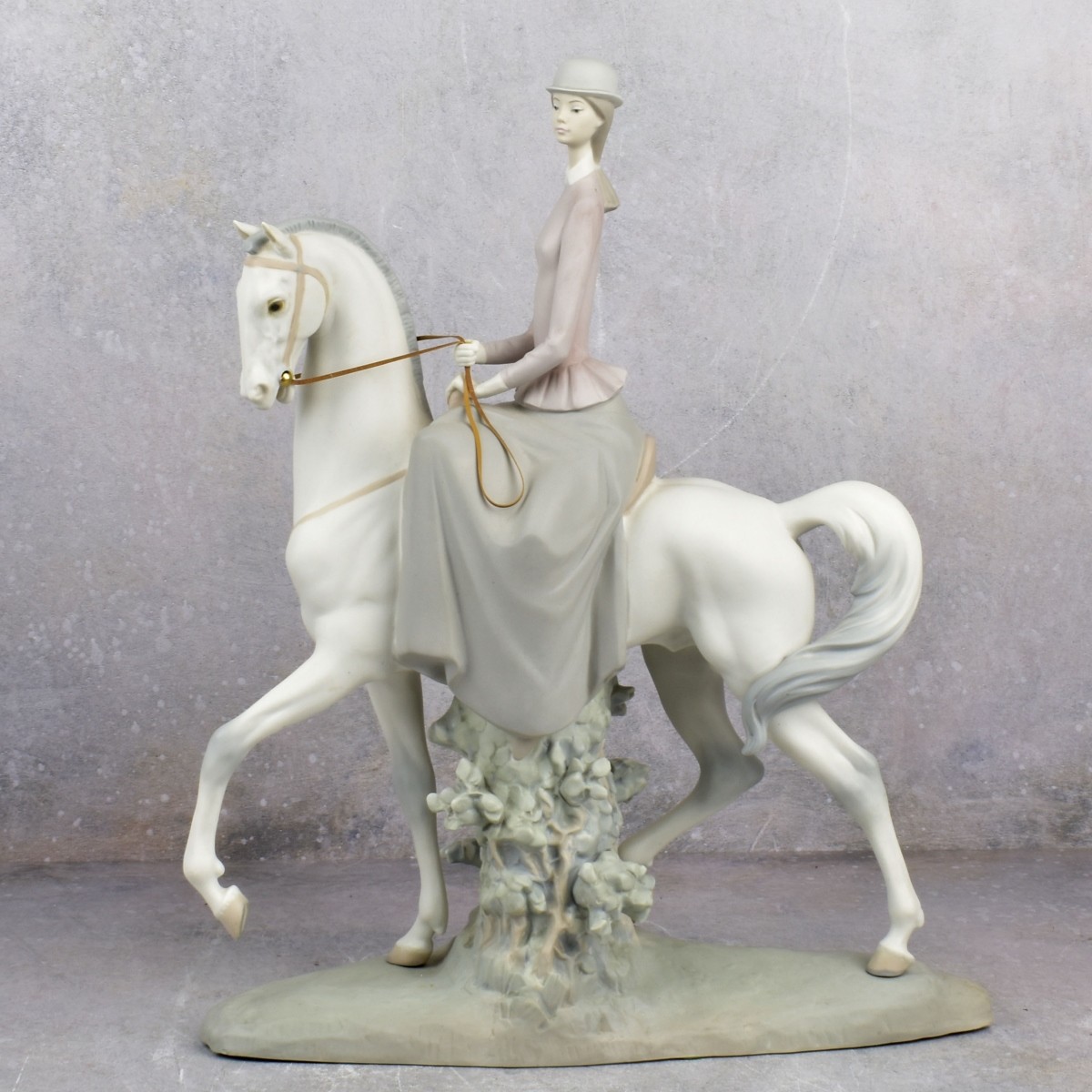 Lladro Bisque Figure of an Elegant Woman