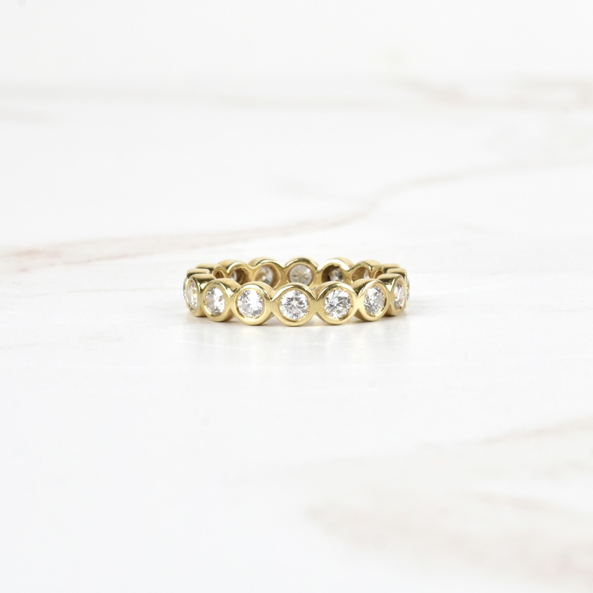 Diamond and 18K Eternity Band