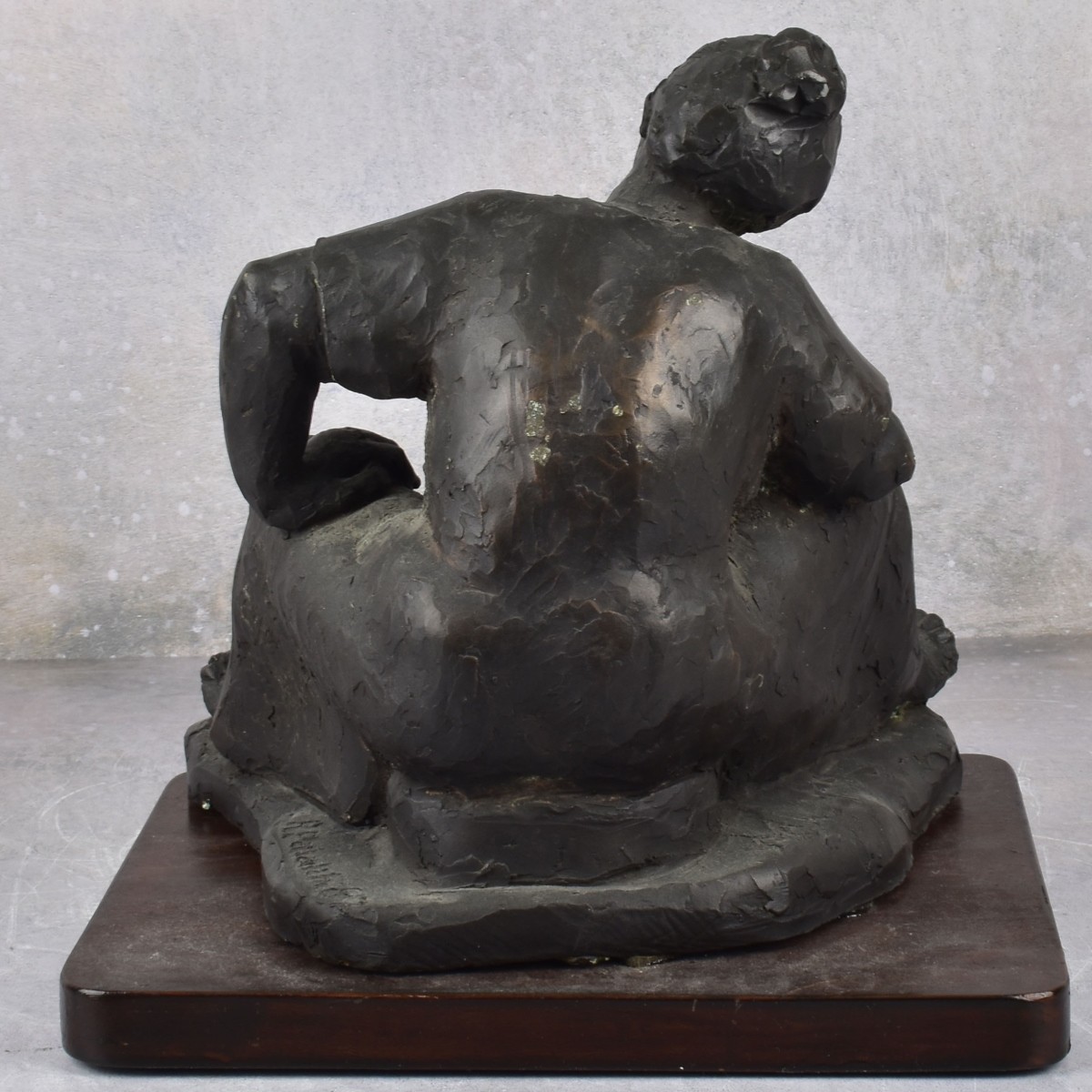 Painted Pottery Sculpture of a Seated Lady