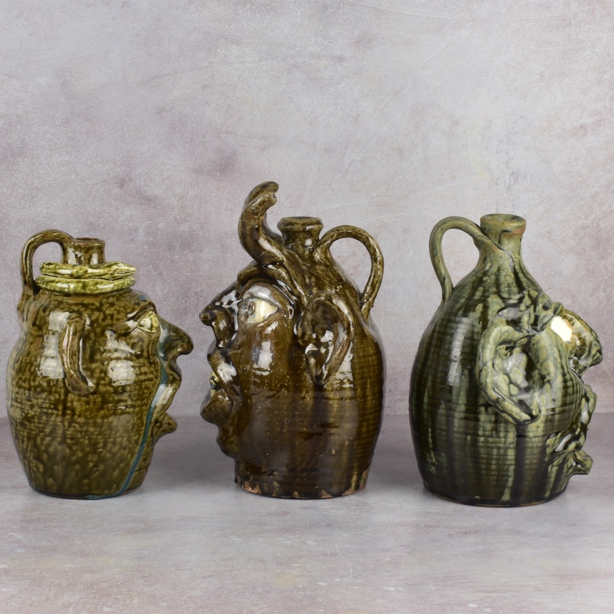 W.A. Flowers Folk Art Pottery Jugs