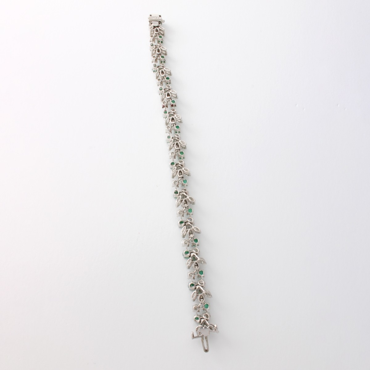 Diamond, Emerald and Platinum Bracelet
