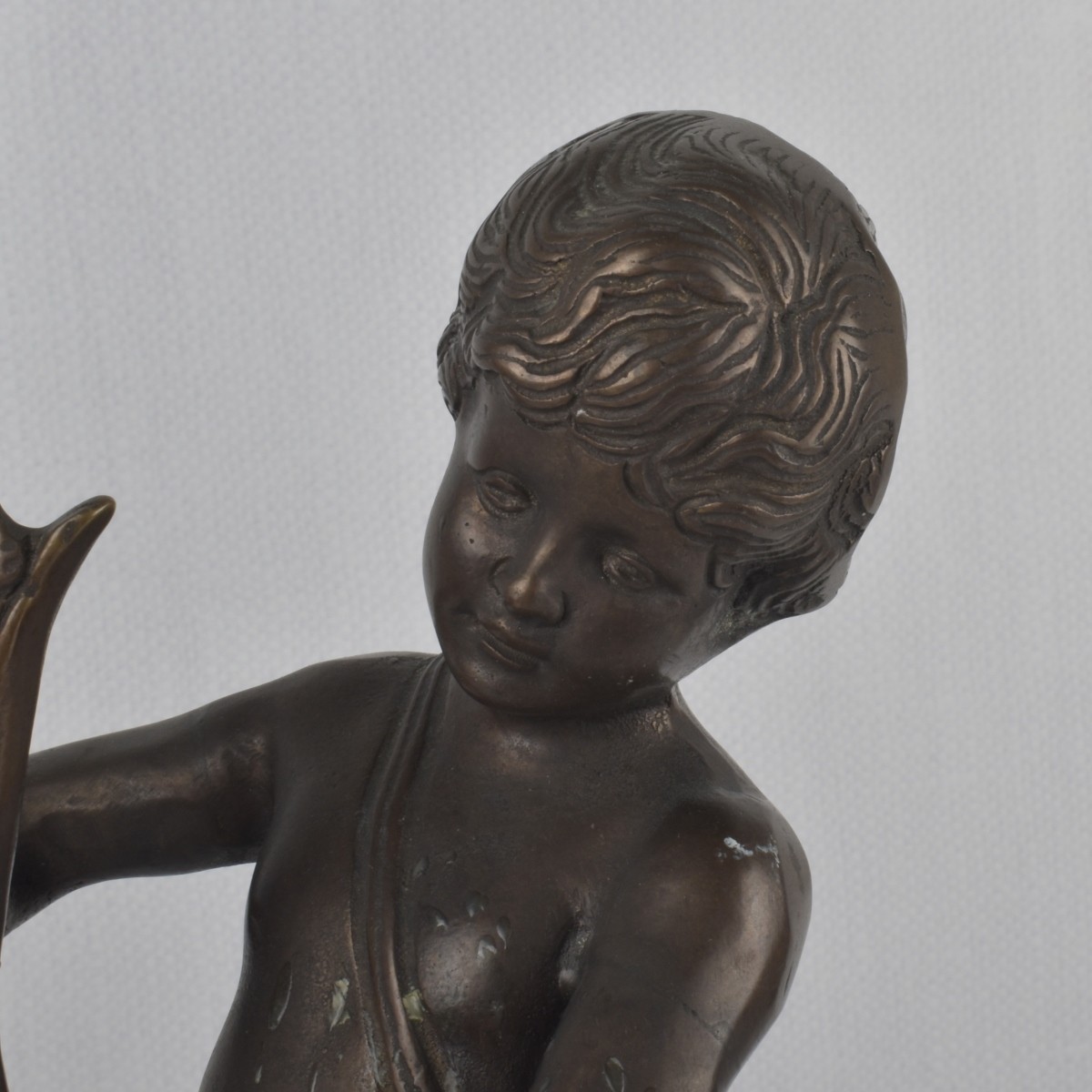 Pair of Bronze Figural Candlesticks