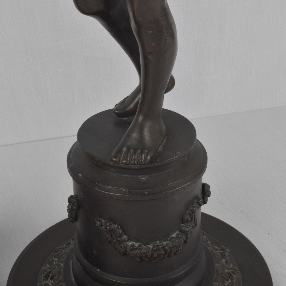 Pair of Bronze Figural Candlesticks