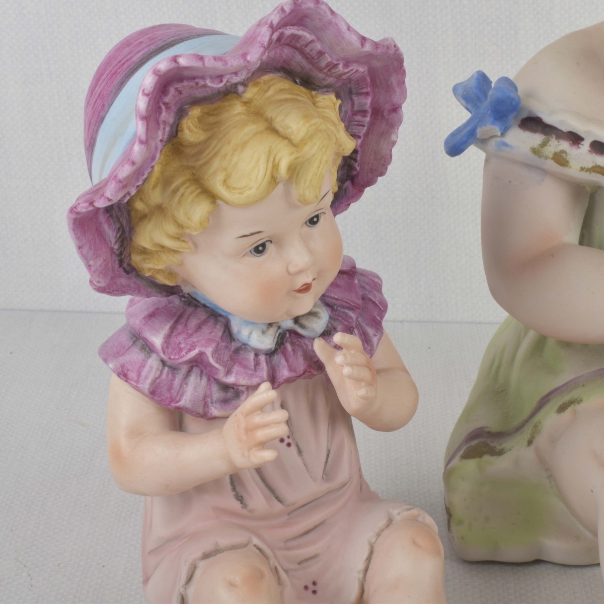 Porcelain Bisque Piano Babies