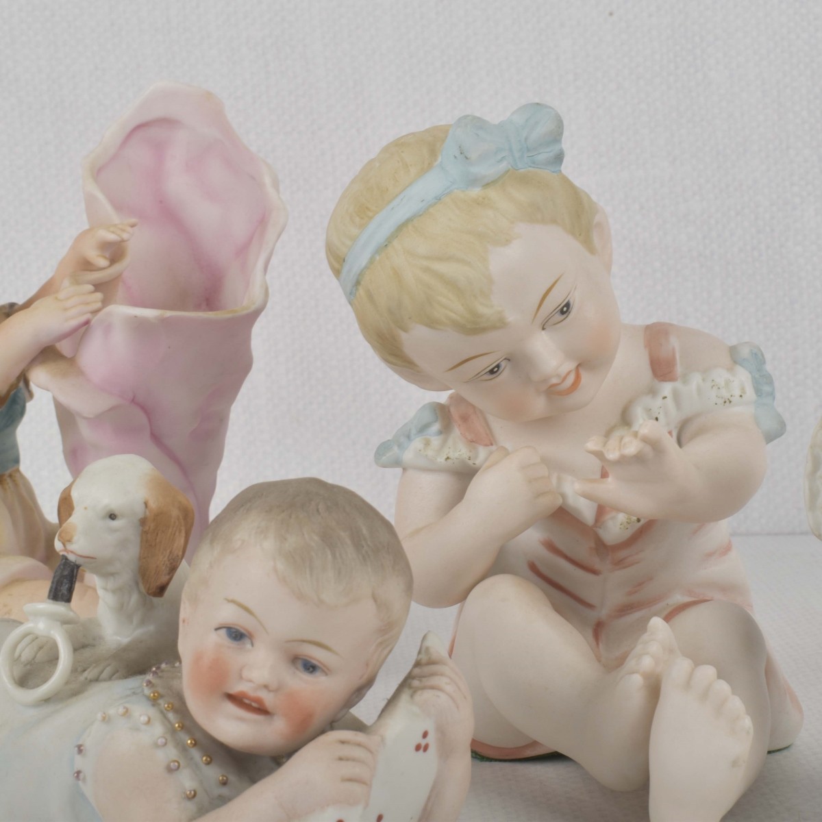 Porcelain Bisque Piano Babies