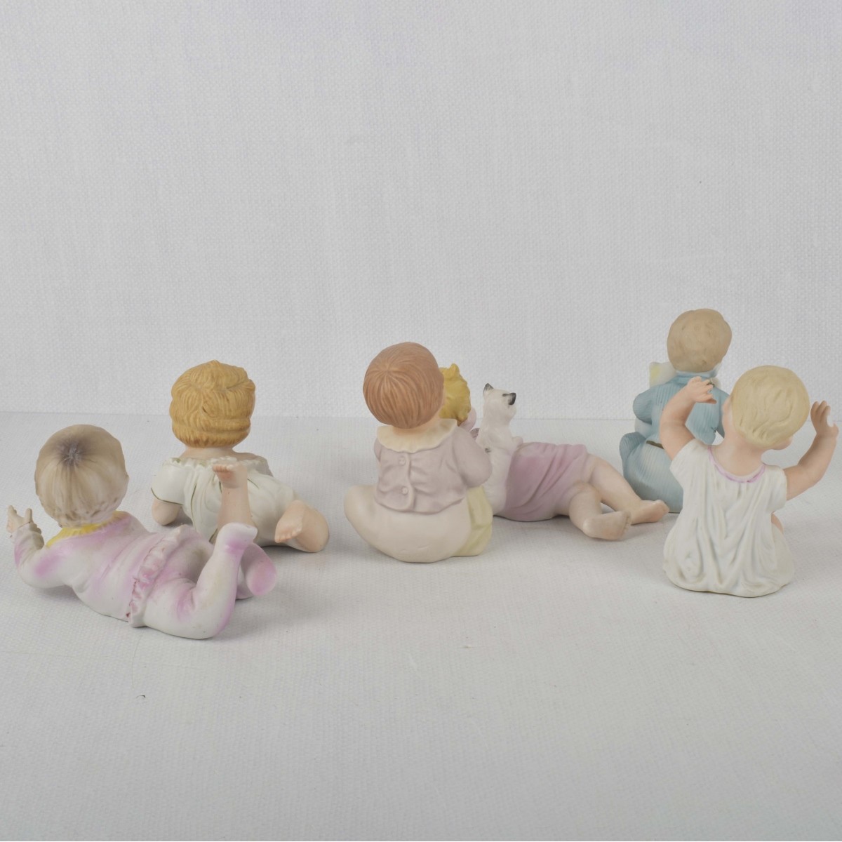 Porcelain Bisque Piano Babies